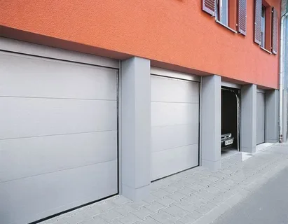 Matériels pour portes de garage sectionnelles et enroulable
